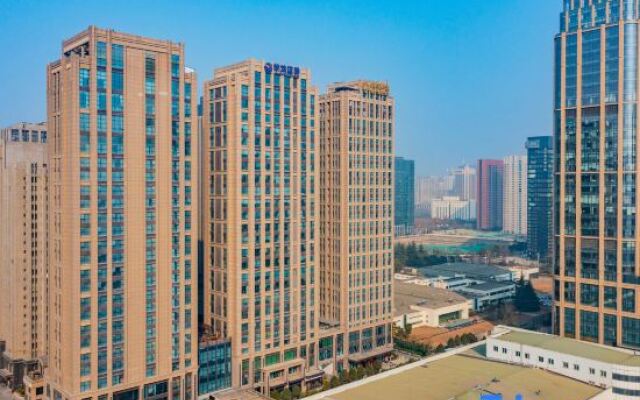 Wutong Apartments Hotel