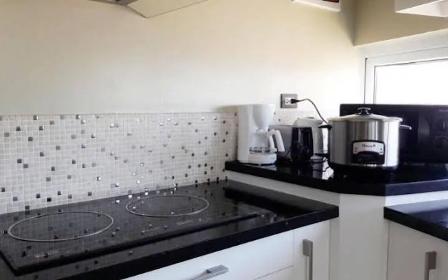 Karuna Suites & Residence