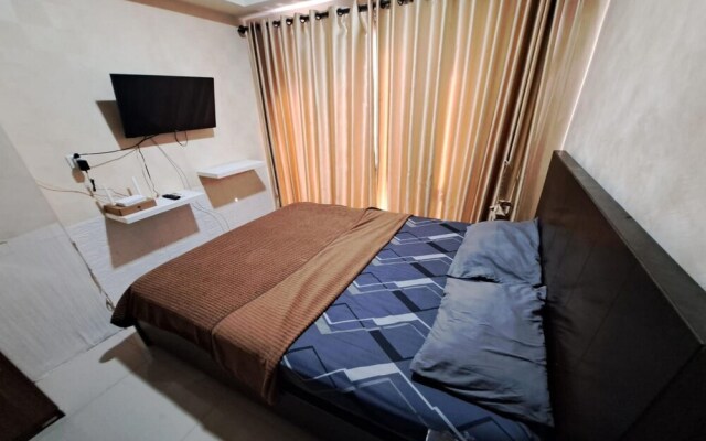 Capital O 93481 Apartement Grand Asia Afrika By Kelola Room