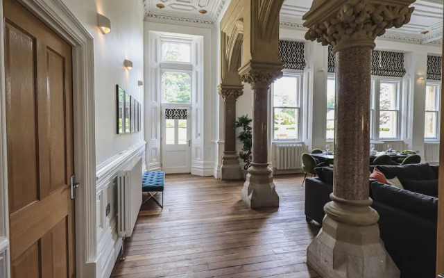 The Wilfred Suite Stone Cross Mansion