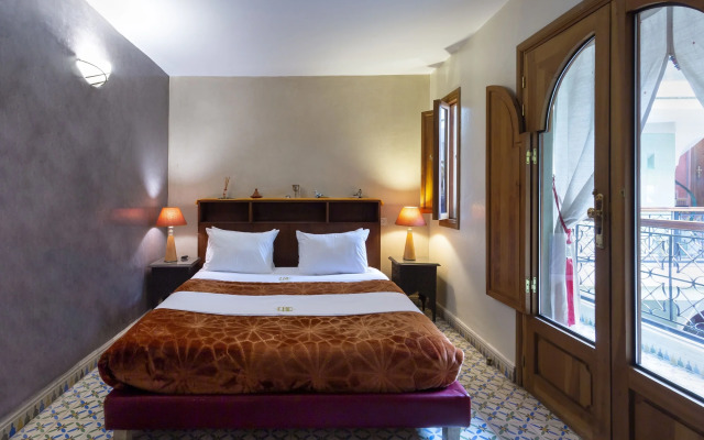 Riad l'heure D'été