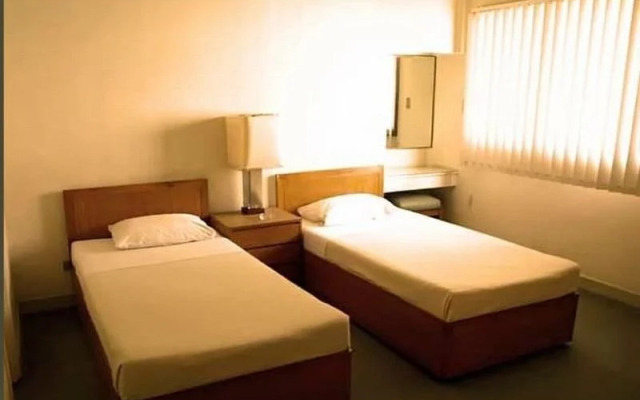 Amorsolo Mansion Apartments & Suites