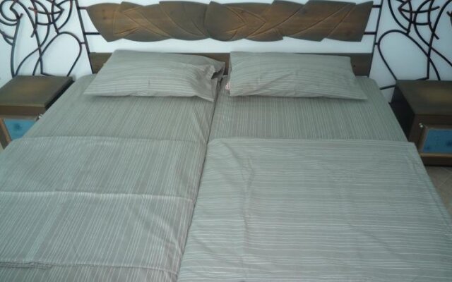 Neva Guest Rooms and Studios