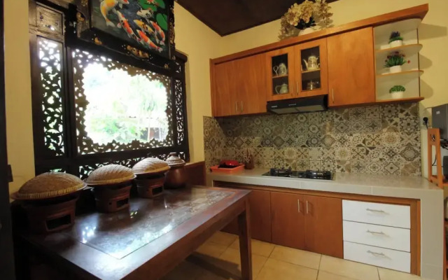 Capital O 94011 Binhari Guest House