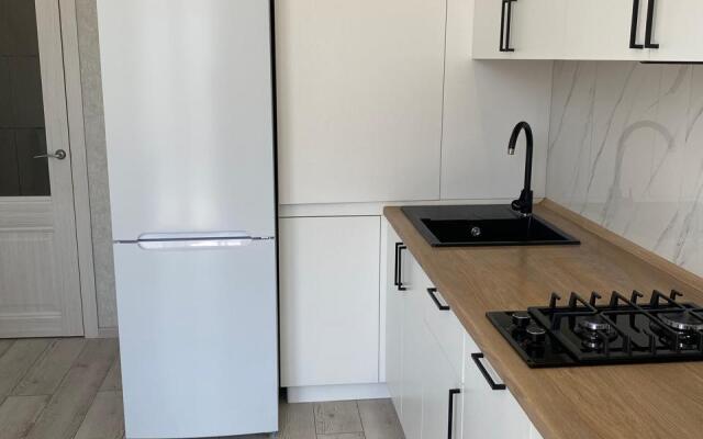 Апартаменты на улице Олега Анофриева 1 к9