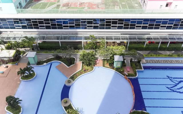 Homey and Comfy 2BR at Green Pramuka City Apartment