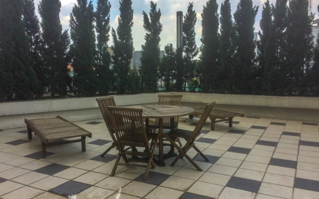 Warm and Homey Studio at The Oasis Cikarang Apartment By Travelio