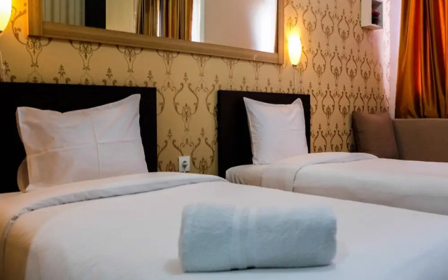 Minimalist and Comfy Studio The Oasis Cikarang Apartment By Travelio