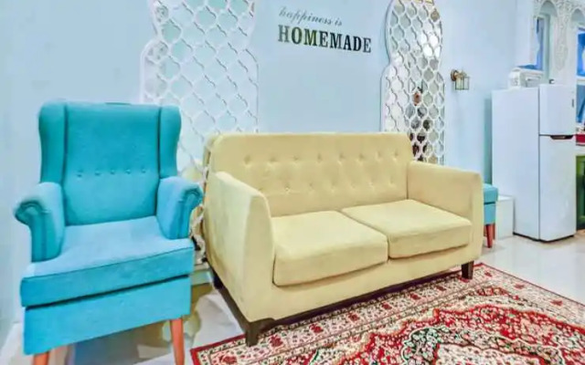 SPOT ON 90728 Griyapram Riverside Syariah