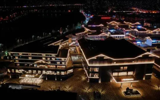 Maison New Century Hotel Lu'an