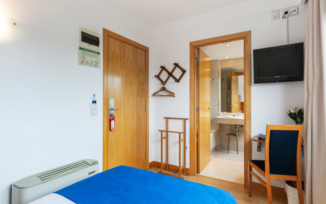 Отель Sercotel de los Reyes