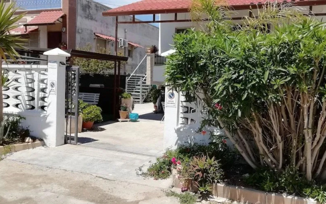 Baia del Conte Apartments