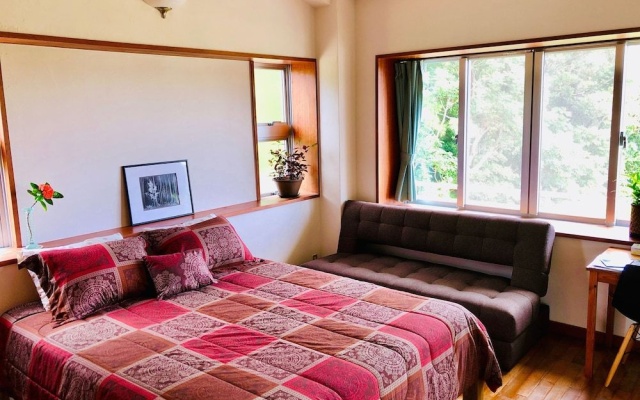 Tom and Rimi's – Guest Rooms – Kumejima