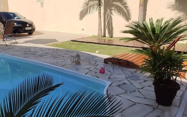 Casa com piscina em Caraguatatuba