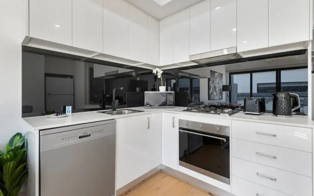 Comfortable 2BR Retreat With Balcony & Parking