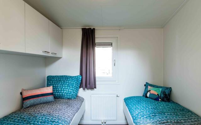 Modern chalet with a dishwasher, located in Park De Veluwe