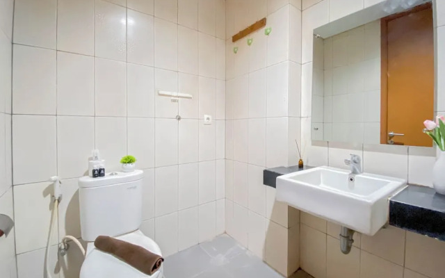 Homey and Comfortable 1BR Apartment at Dago Suites