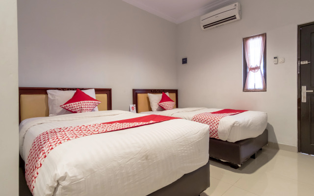 Super OYO 283 Helvetia Residence