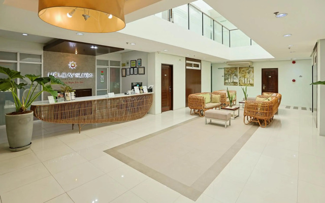 Holiday Suites Business District (Empire Suites Hotel)