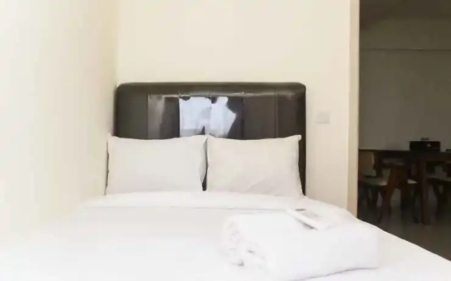 Homey and Comfortable 3BR at Meikarta Apartment By Travelio
