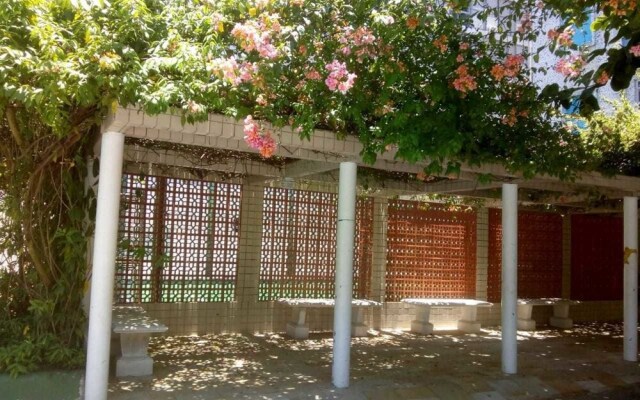 Apart de frente para a praia