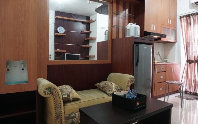 Homey and Warm 2BR Green Pramuka Apartment