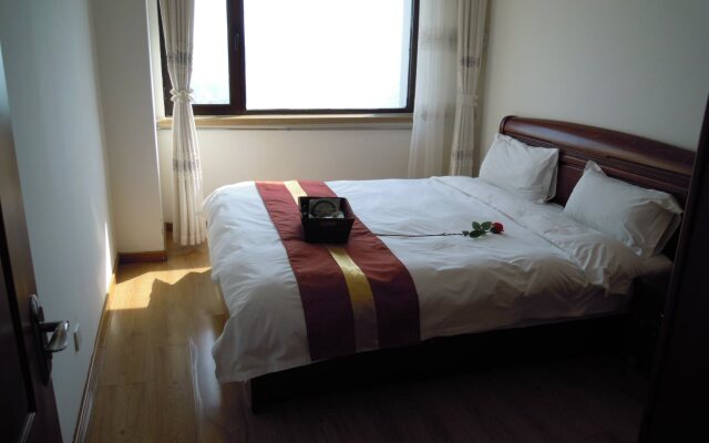 Dalian Ming Rui Jin Feng Apartment