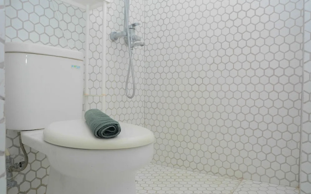 Best Studio Room with Wall Bed Tifolia Apartment