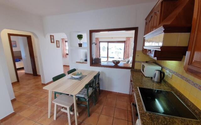 2 bedroom villa 'The Bungalow' with private heated pool.
