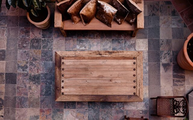 Riad Mellado by Grupo Afekto