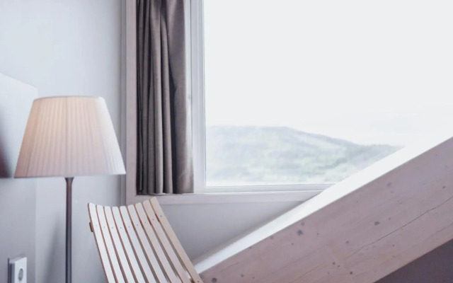 Wood Hotel by Frich's