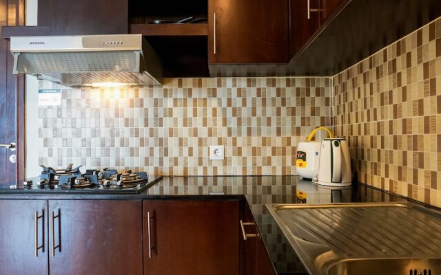 Cozy 2BR at Empyreal Epicentrum Apartment By Travelio