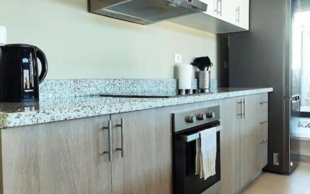 Tawila - Lovely 2-bedroom unit with shared pool