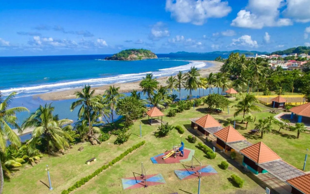 Haut de villa dans son écrin de verdure