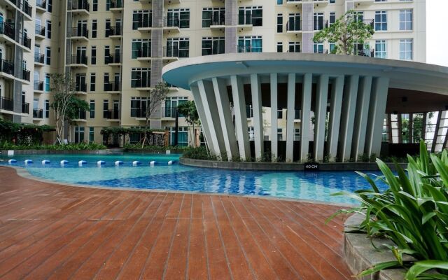 Warm and Cozy Studio at Puri Orchard Apartment