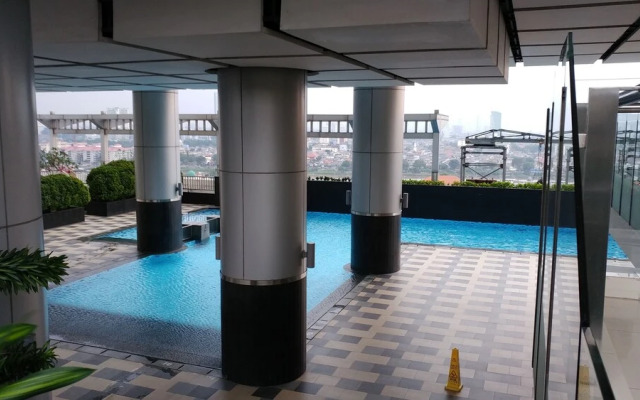 Big Studio at Cosmo Terrace Apartment Thamrin City By Travelio