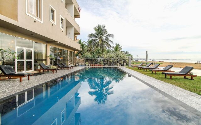 Capital O 311 Grace Beach Resort
