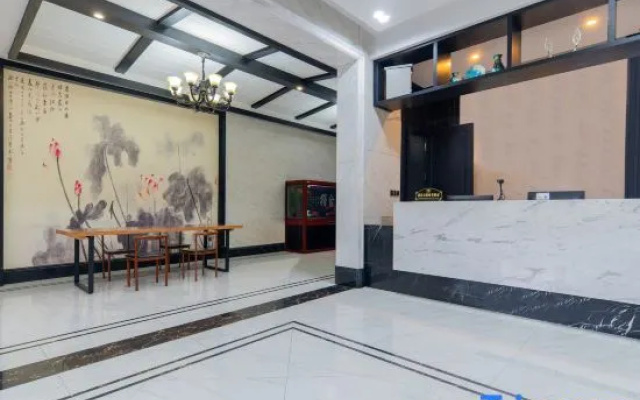 Huajing Boutique Chain Hotel (Longgang Pudong)
