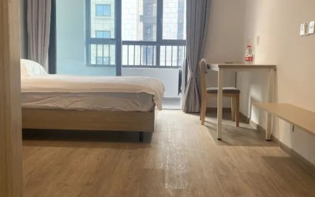 Milu Apartment (Shanghai Zhoupu Wanda Branch)