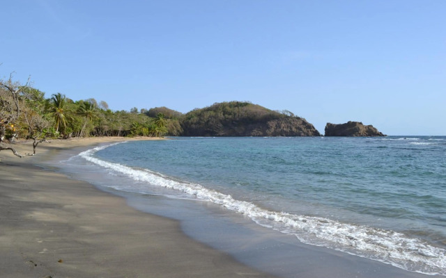 Haut de villa dans son écrin de verdure
