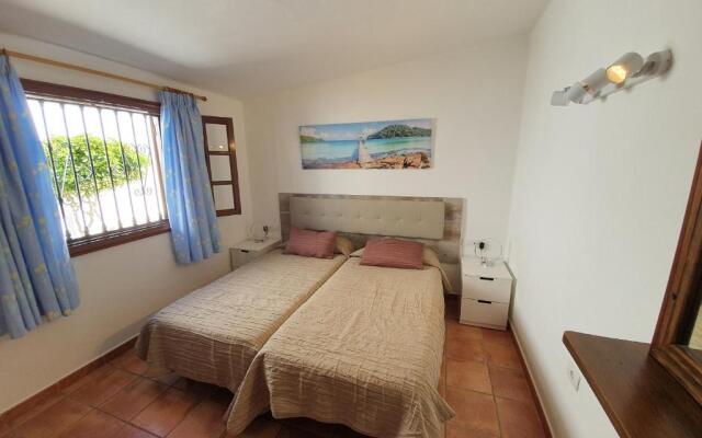 2 bedroom villa 'The Bungalow' with private heated pool.