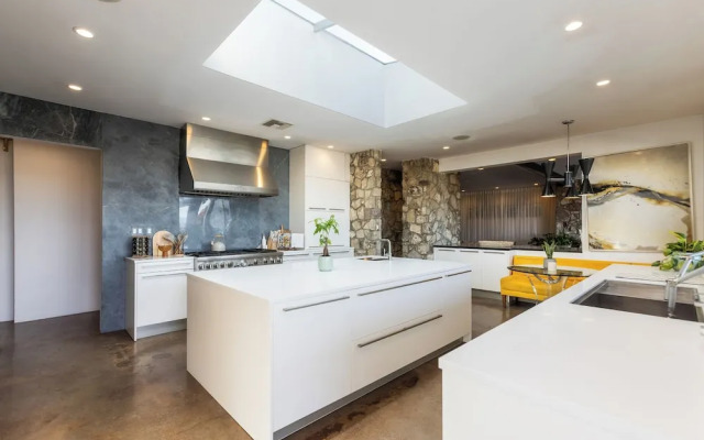 Stylish Hillside Retreat with Pool & Views