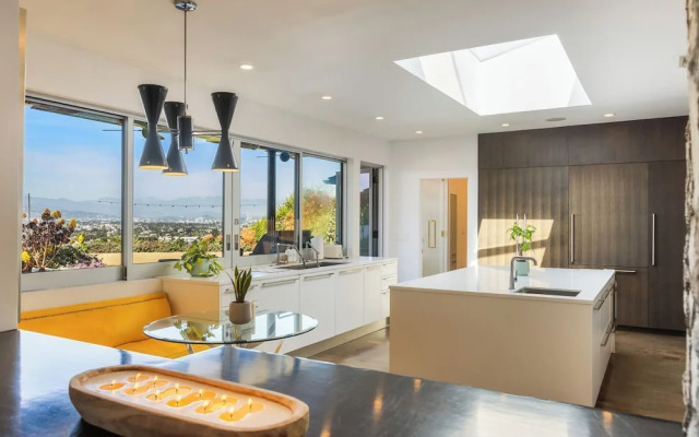 Stylish Hillside Retreat with Pool & Views