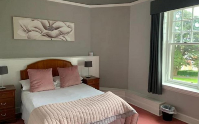 OYO Dunmar House Hotel