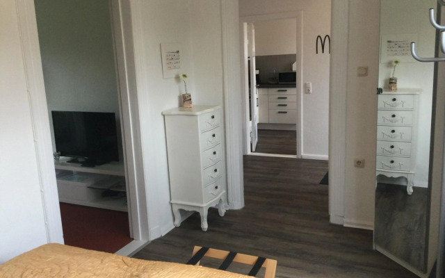 Ferienhaus Us lütt Hus und das Zimmer Linde im Haupthaus