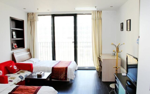 Enji Apartment Hotel Bainianhui - Dalian