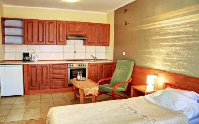 Apartamenty i Restauracja Janus