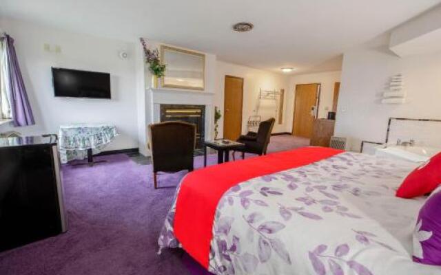 Brass Bell Inn and Suites