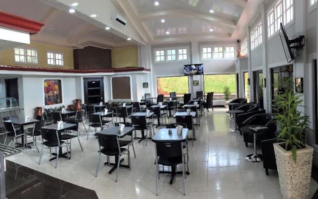 Prado Inn & Suites
