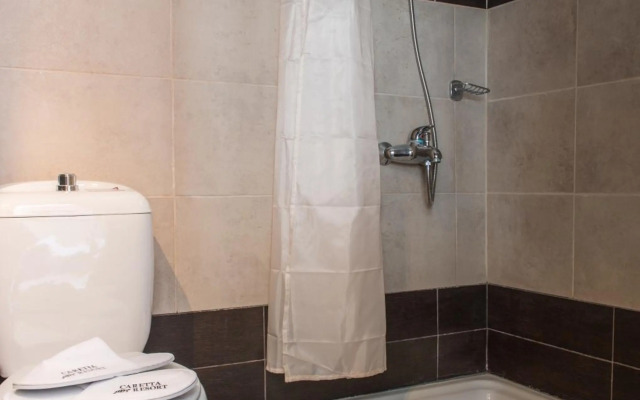 Отель Caretta Village